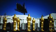 Freshly-painted Oscar statues at a parking lot outside the Dolby Theatre in Hollywood, Los Angeles, yesterday. 
