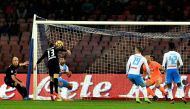 Atalanta's defender Mattia Caldara (L) scores a goal during the Italian Serie A football match Napoli vs Atalanta on February 25, 2017 at San Paolo stadium in Naples. / AFP / ALBERTO PIZZOLI

