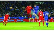 Leicester City's Jamie Vardy (third left) scores their third goal against Liverpool during their Premier League match played at King Power Stadium on Monday.