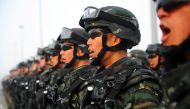 Paramilitary policemen stand in formation as they take part in an anti-terrorism oath-taking rally, in Kashgar, Xinjiang Uighur Autonomous Region, China, February 27, 2017. REUTERS/Stringer