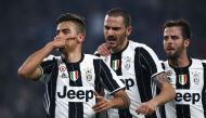 Juventus' forward Paulo Dybala from Argentina (L) celebrates after scoring with his teammates Juventus' defender Leonardo Bonucci (C) and Juventus' midfielder Morale Pijanic of Bosnia-Erzegovina during the Italian Tim Cup football match between Juventus a