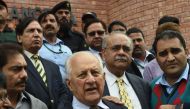 Chairman of the Pakistan Cricket Board (PCB) Shaharyar Khan (C) talks to journalists outside the Gaddafi Cricket Stadium in Lahore on February 28, 2017, ahead of the final cricket match of the Pakistan Super League (PSL).(AFP / ARIF ALI)