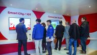 Visitors at the Ooredoo Pavilion at 2017 Mobile World Congress in Barcelona.