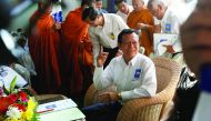 Kem Sokha, leader of the Cambodia National Rescue Party, gestures at party's headquarters in Phnom Penh, yesterday.