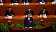 Chinese Premier Li Keqiang delivers his report during the opening session of the National People’s Congress, China’s legislature, in Beijing’s Great Hall of the People on March 5, 2017. / AFP PHOTO / WANG ZHAO.