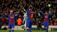 Barcelona's Lionel Messi, Ivan Rakitic and Neymar celebrate a goal. Reuters/Albert Gea