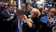Traders work on the floor of the New York Stock Exchange (NYSE) in New York City, U.S., September 13, 2016. REUTERS/Brendan McDermid.