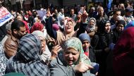 Dozens of Egyptians take part in demonstration in front of a government office in downtown Alexandria on March 7, 2017, against the decision of the supply ministry to limit the distribution of subsidised bread to holders of a new system of digital cards i