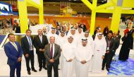 Mwani Qatar officials at the QITCOM exhibition and conference.