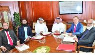 Sheikh Ali bin Abdullah bin Thani Al Thani (third right), Chairman of Pak-Qatar Takaful Group, Abdulbasit Ahmad Al Shaibei (third left) and other senior officials of the Group during a board meeting.