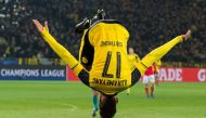 Dortmund's Gabonese forward Pierre-Emerick Aubameyang celebrate scoring during the UEFA Champions League Round of 16, 2nd-leg football match Borussia Dortmund v SL Benfica in Dortmund, western Germany on March 8, 2017.  AFP / dpa / Guido Kirchner
