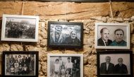 Photographs of former inhabitants of Sarnago hanging on a wall of the 'Friends of Sarnago' association museum, in the uninhabited village of Sarnago, in the northern Spanish province of Soria, photographed on February 28, 2017. Rural emigration in many ar