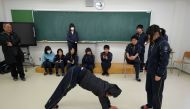 This picture taken on February 22, 2017 shows members of a theatre club at Futaba Future School during a practice session in Hirono, Fukushima prefecture. In the immediate aftermath of the Japan 2011 tsunami disaster which left 18,500 people dead or missi