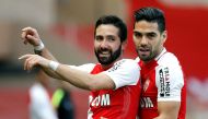 Monaco's Joao Moutinho reacts after scoring with teammate Radamel Falcao. REUTERS/Eric Gaillard
