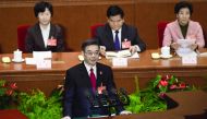 Zhou Qiang, President of the Supreme People's Court, speaking at the Third Plenary Session of the Fifth Session of the 12th National People's Congress at the Great Hall of the People in Beijing