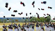 New officers of the Armed Forces of the Philippines throw their hats during graduation ceremonies at the Philippine Military Academy in Baguio city, in northern Philippines March 12, 2017. REUTERS/Harley Palangchao