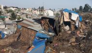 Damaged dwellings after a landslide in the main city dump of Addis Ababa (AFP Photo/ZACHARIAS ABUBEKER).