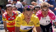 (FILES) This file photo taken on July 13, 2000 shows the yellow jersey US Lance Armstrong (C) riding with German jan Ullrich (R) and Frenchman Richard Virenque on the Mont Ventoux climb during the 12th stage of the 87th Tour de France, southern France.  A