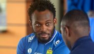 Former AC Milan, Real Madrid and Chelsea midfielder Michael Essien of Ghana (L) takes part in a ceremony announcing his joining of the Indonesian football club Persib in Bandung on March 14, 2017.   AFP / TIMUR MATAHARI
