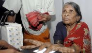 A villager goes through the process of a fingerprint scanner during Unique Identification (UID) database system in the Pathancheru village, in Medak district of Andhra Pradesh April 27, 2010. REUTERS/Krishnendu Halder