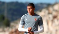 Monaco's French forward Kylian Mbappe Lottin arrives for a training session on the eve of their UEFA Champions League football match Monaco against Manchester City on March 14, 2017 at the 