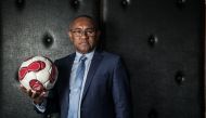 (FILES) This file photo taken on February 13, 2017 shows Ahmad Ahmad, incumbent President of Malagasy Football Federation, posing during a photo session at his office in Antananarivo.  / AFP / RIJASOLO
