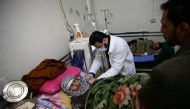  man receives treatment inside the dialysis center in the rebel-held town of Douma, in the besieged Eastern Ghouta suburbs of Damascus, Syria March 15, 2017. REUTERS/Bassam Khabieh
