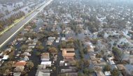 Thousands of houses in New Orleans, Louisiana remain under water one week after Hurricane Katrina went through Louisiana, Mississippi, and Alabama in this September 5, 2005 file photo. REUTERS/Allen Fredrickson