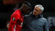Manchester United's Paul Pogba walks off to be substituted after sustaining an injury as manager Jose Mourinho looks. Reuters / Jason Cairnduff
