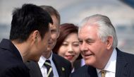 US Secretary of State Rex Tillerson (R) is greeted as he arrives at Beijing Capital International Airport in Beijing, China, Saturday, March 18, 2017. REUTERS/Mark Schiefelbein/Pool

