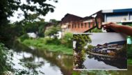 In this photograph taken on January 31, 2017, a photograph of the previous condition of Tongkol kampung is juxtaposed against its current condition in Jakarta. AFP / Bay Ismoyo 

