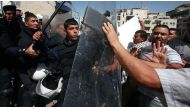 File photo of Palestinian Security Photos acting against demonstrators in Ramallah. / AFP.