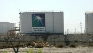 Oil tanks seen at the Saudi Aramco headquarters during a media tour at Damam city in this file photo dated November 11, 2007. REUTERS/ Ali Jarekji
