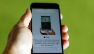 An Apple iphone 6 with Apple Pay is shown in this photo illustration in Encinitas , California June 3, 2015. REUTERS/Mike Blake
