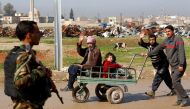 Displaced Iraqis flee their homes as Iraqi forces battle with Islamic State militants in western Mosul, Iraq March 24, 2017. REUTERS/Suhaib Salem