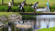 Alex Cejka (L) of Germany and Nick Taylor (R) of Canada walk up to the 13th green during the second round of the Puerto Rico Open at Coco Beach on March 24, 2017 in Rio Grande, Puerto Rico. Michael Cohen/AFP
