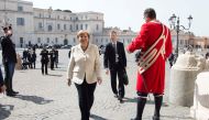 This handout picture released by the Italian Presidency (Quirinale) shows Germany's Chancellor Angela Merkel arriving, on March 25, 2017 at the Quirinale presidential palace before a meeting with Italian President as part of a special summit of European l
