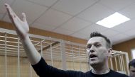 Russian opposition leader Alexei Navalny attends a hearing after being detained at the protest against corruption and demanding the resignation of Prime Minister Dmitry Medvedev, at the Tverskoi court in Moscow, Russia March 27, 2017. REUTERS/Tatyana Make
