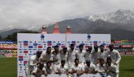 India's cricket team poses with the Border-Gavaskar trophy during the fourth day of the fourth and final cricket Test match between India and Australia at The Himachal Pradesh Cricket Association Stadium in Dharamsala on March 28, 2017. (AFP / PRAKASH SIN