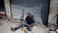 A member of federal police reloads his weapon during a battle with Islamic State militants in Mosul, Iraq March 29, 2017. REUTERS/Khalid al Mousily