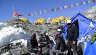 FILE PHOTO: Sherpas sit at the Mount Everest base camp in April 2014. REUTERS/Phurba Tenjing Sherpa
