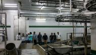 In this photograph taken on March 25, 2017, Indian workers stand inside an empty abattoir in Meerut. A zealous campaign to protect cows -- considered sacred by Hindus -- by a new right-wing government in Uttar Pradesh state has sent India's $4.8 billion b