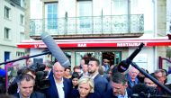 Marine Le Pen, French National Front leader and candidate for the presidential election, talking to residents as she visits a market in Concarneau, yesterday.