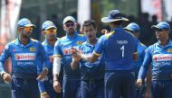 Sri Lankan cricketer Nuwan Kulasekara (C) celebrates with teammates after he dismissed Bangladesh batsman Tamim Iqbal during the third and final one day international (ODI) cricket match between Sri Lanka and Bangladesh at The Sinhalese Sports Club (SSC) 