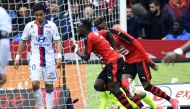 Rennes' Congolese forward Firmin Mubele Ndombe (C) celebrates after scoring a goal during the French L1 football match between Rennes and Lyon on April 2, 2017 at the Roazhon park stadium in Rennes, western France. / AFP / DAMIEN MEYER
