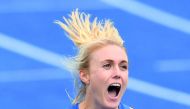 Australia's Sally Pearson celebrates after winning the women's 100 metres hurdles final in Sydney yesterday.