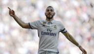 Real Madrid's French forward Karim Benzema celebrates a goal during the Spanish league football match Real Madrid CF vs Deportivo Alaves at the Santiago Bernabeu stadium in Madrid on April 2, 2017. AFP / Javier Soriano