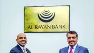 Minister of Municipality and Environment, H E Mohamed bin Abdullah Al Rumaihi (right) with Sultan Choudhury, CEO of Al Rayan Bank.