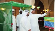 Guests viewing the exhibition at Katara Art Center.