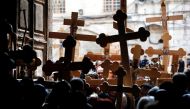 FILE PHOTO: Christian pilgrims enter the Holy Sepulchre Church during a 2015 ceremony in Jerusalem's Old City (AFP Photo / Thomas Coex)
